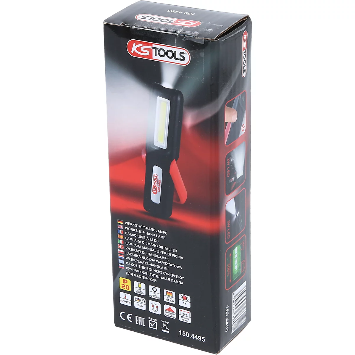 Een KS TOOLS werkplaatshandlamp wordt gepresenteerd. Productinformatie en logo's zijn te zien op de verpakking.